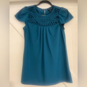 Banana Republic teal blouse.  Cut out detail.